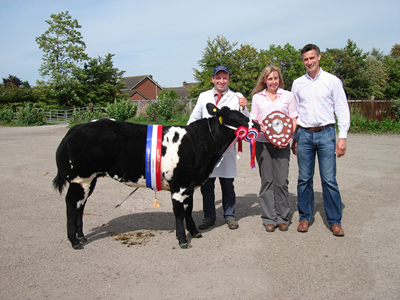 Steph Denny presents the shield to Wyn Jones with Philip Halhead who donated the Club’s perpetual trophy